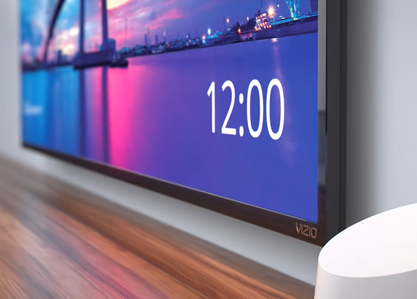 Vizio TV - twelve o'clock and colorful photo of the bridge on it