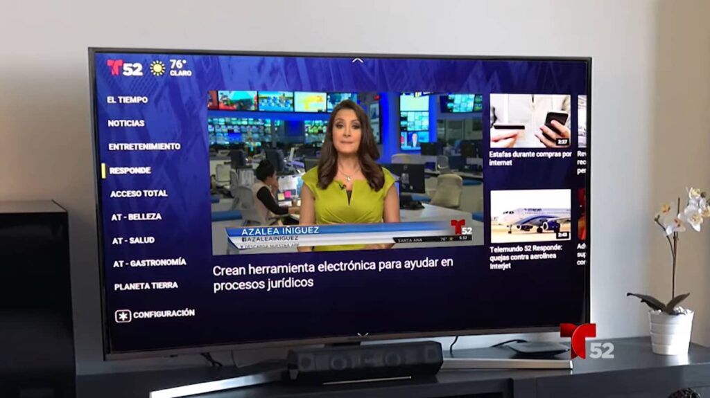 A news anchor presents a story on TV channel Telemundo 52